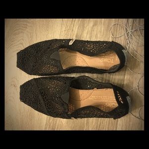 TOMS crochet/lace/embroidered black slip on